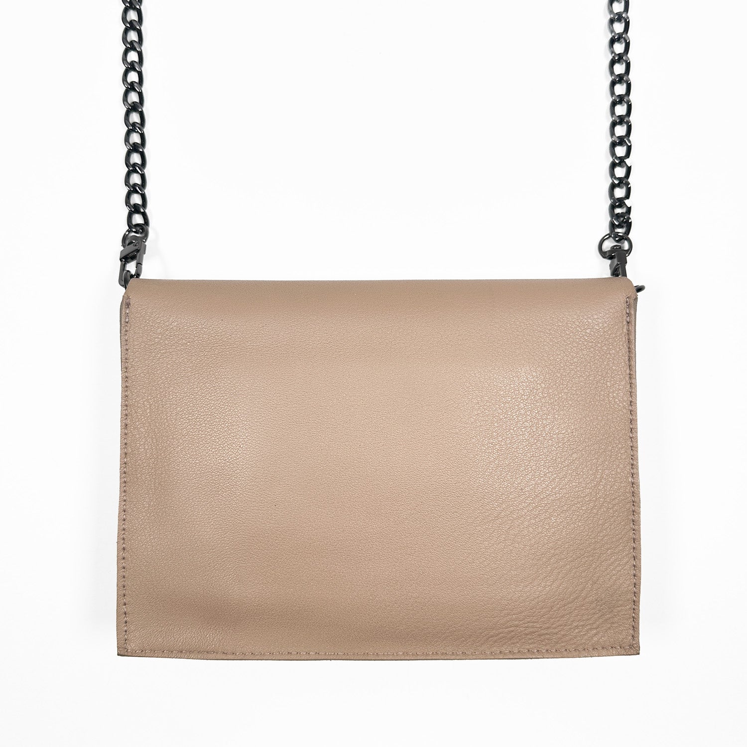 Backside of a taupe leather crossbody bag on white background. The bag has a gunmetal chain strap.