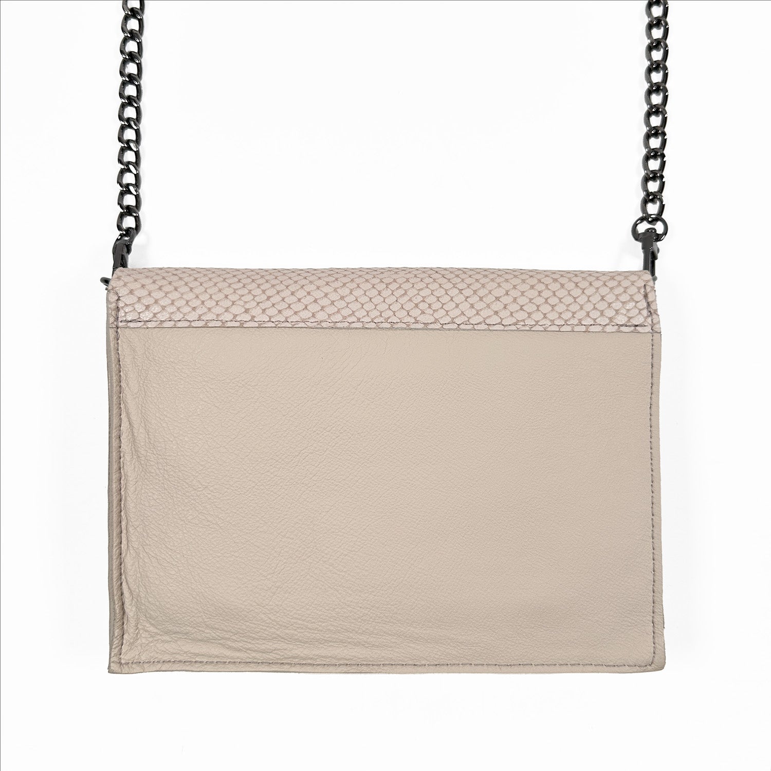 Backside of powder hued leather crossbody bag with a black gunmetal chain strap.
