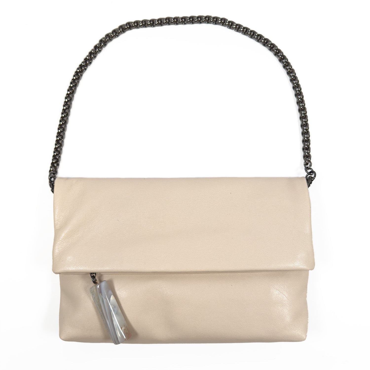 The Farah in almond by evokewomen is a beige leather cross-body bag with a fold-over flap and an elegant black snake spine chain strap.