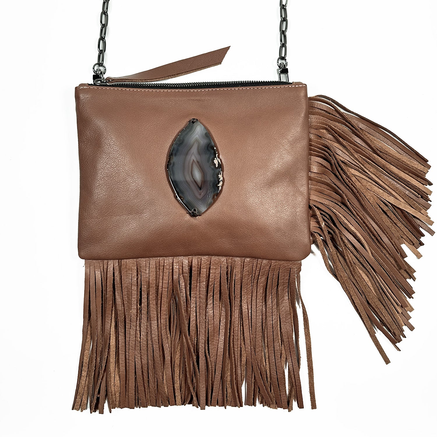 Introducing the Fringe bag - nutshell by evokewomen, crafted from luxurious brown leather and adorned with elegant leather fringes. It features a captivating central agate stone accent and a fashionable chain strap, making it the ideal accessory to infuse an earthy vibe into your adventurous style.