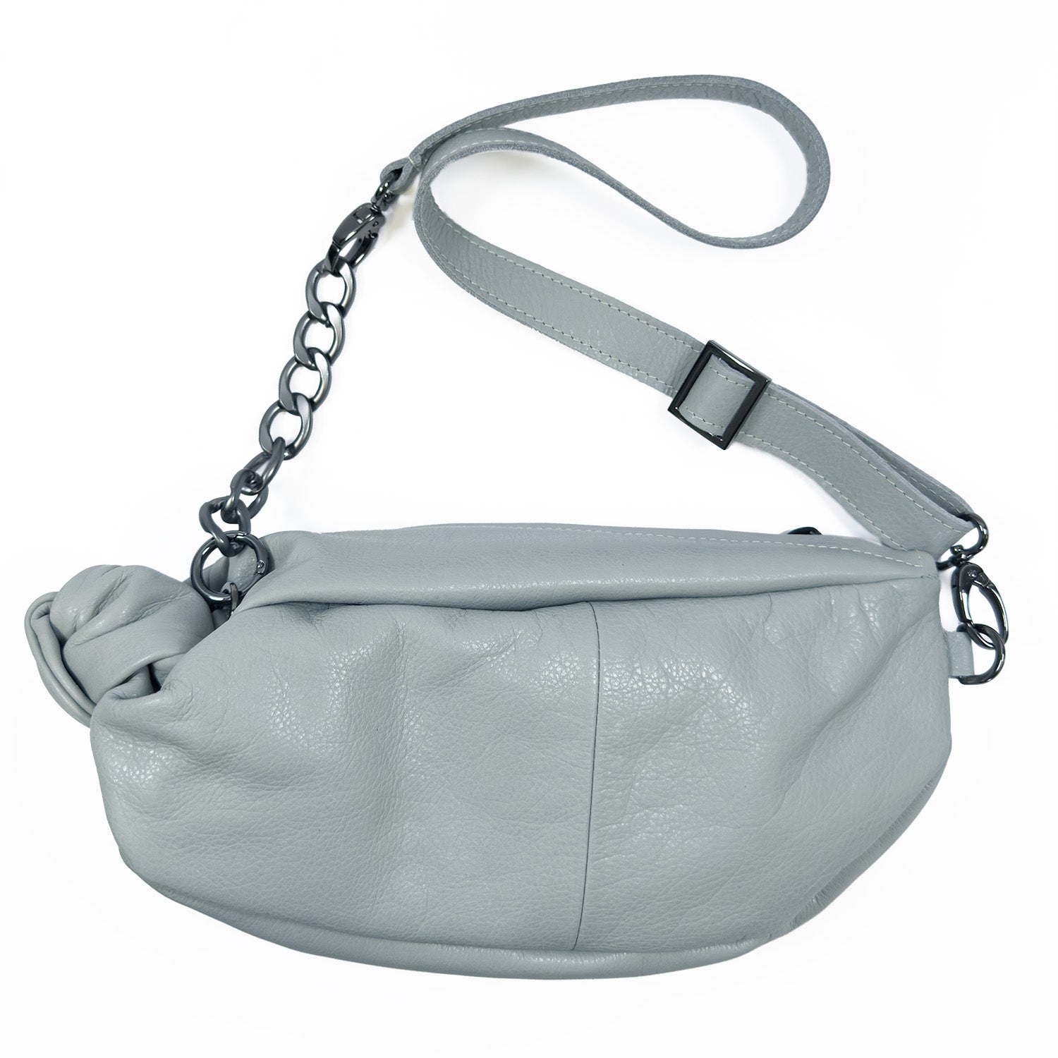 The LONDON - LIGHT SMOKE by evokewomen is a gray leather crossbody handbag featuring a knotted design and an adjustable shoulder strap with chain links on one side.