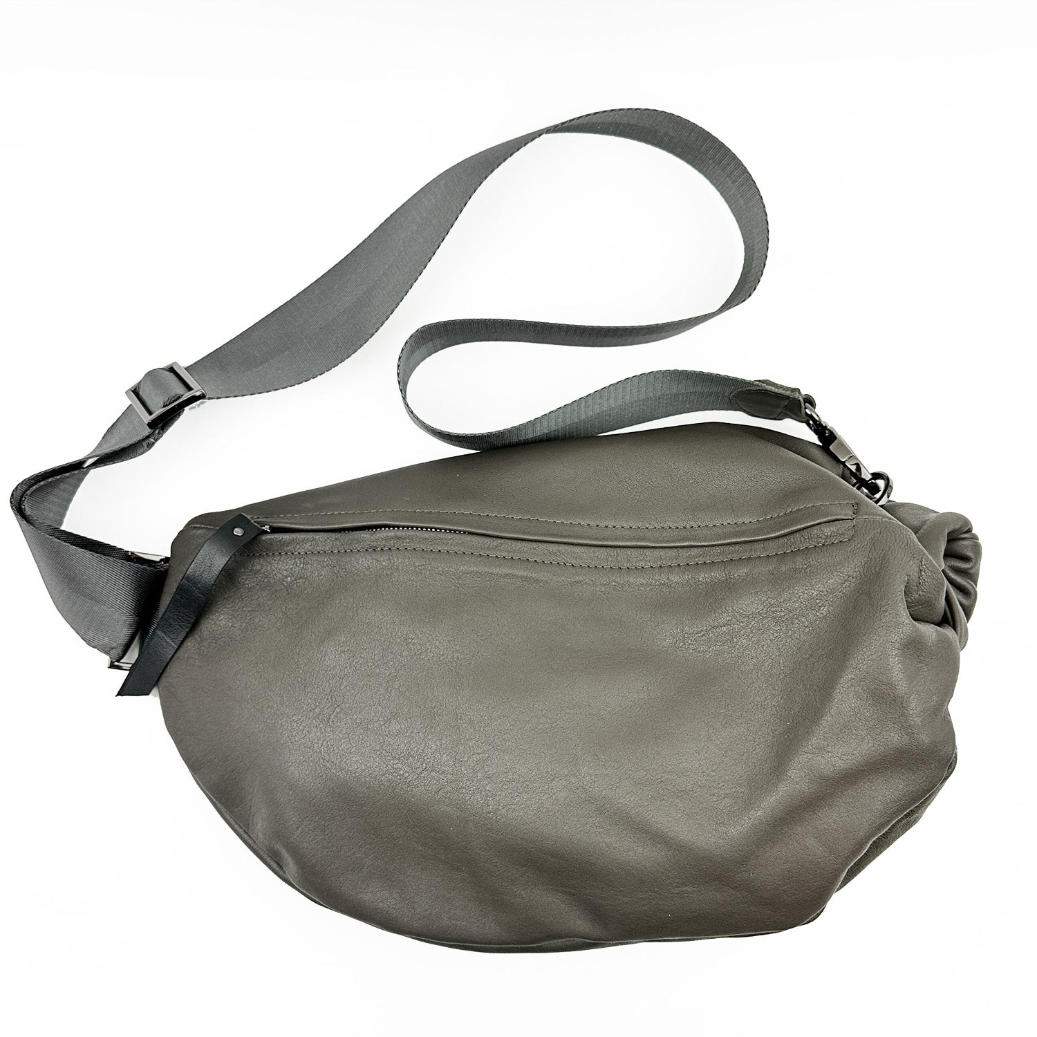 Introducing the LULA - OLIVE-GREY by evokewomen, a sophisticated sling bag crafted from premium leather. It features an adjustable strap and a zippered main compartment for functionality and style.