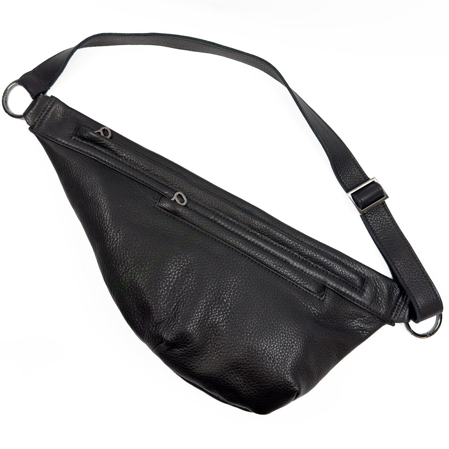 The Sienna bag in black by evokewomen is a stylish and versatile leather sling bag. It includes two zippered compartments and an adjustable strap, making it suitable for any occasion.