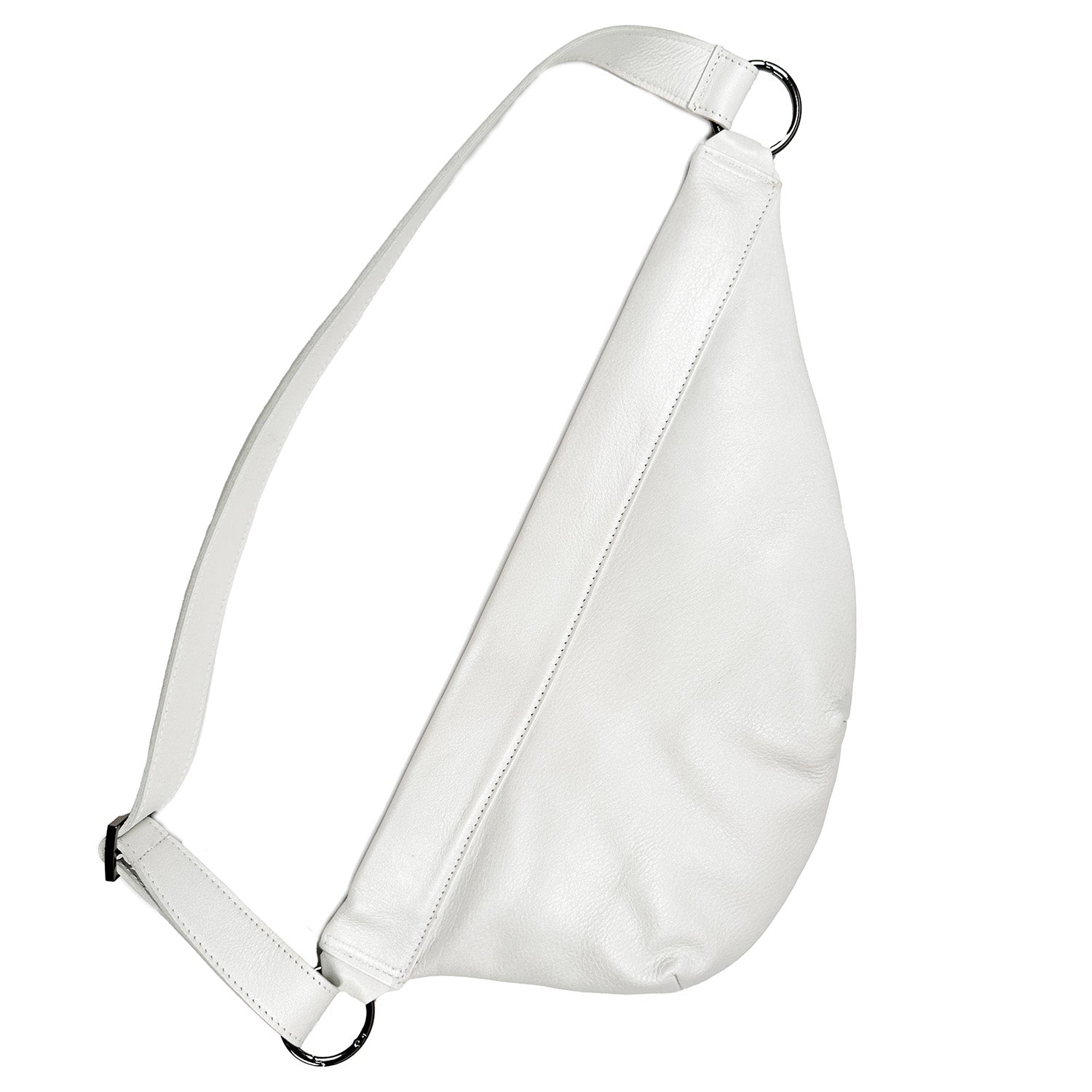 Introducing the Sienna by evokewomen, a pearl white leather sling bag adorned with a diagonal strap and two metal rings, ideal for enhancing any ensemble with its versatile charm.