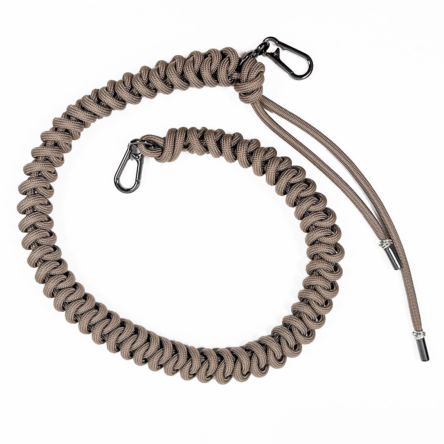 Sand colored knotted paracord strap with 2 high end gunmetal colored swivel hooks and tassel ends on white background.