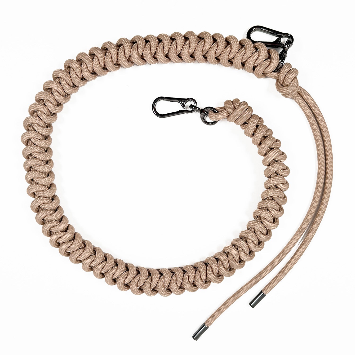 Light beige knotted paracord strap with 2 high end gunmetal colored swivel hooks and tassel ends on white background.