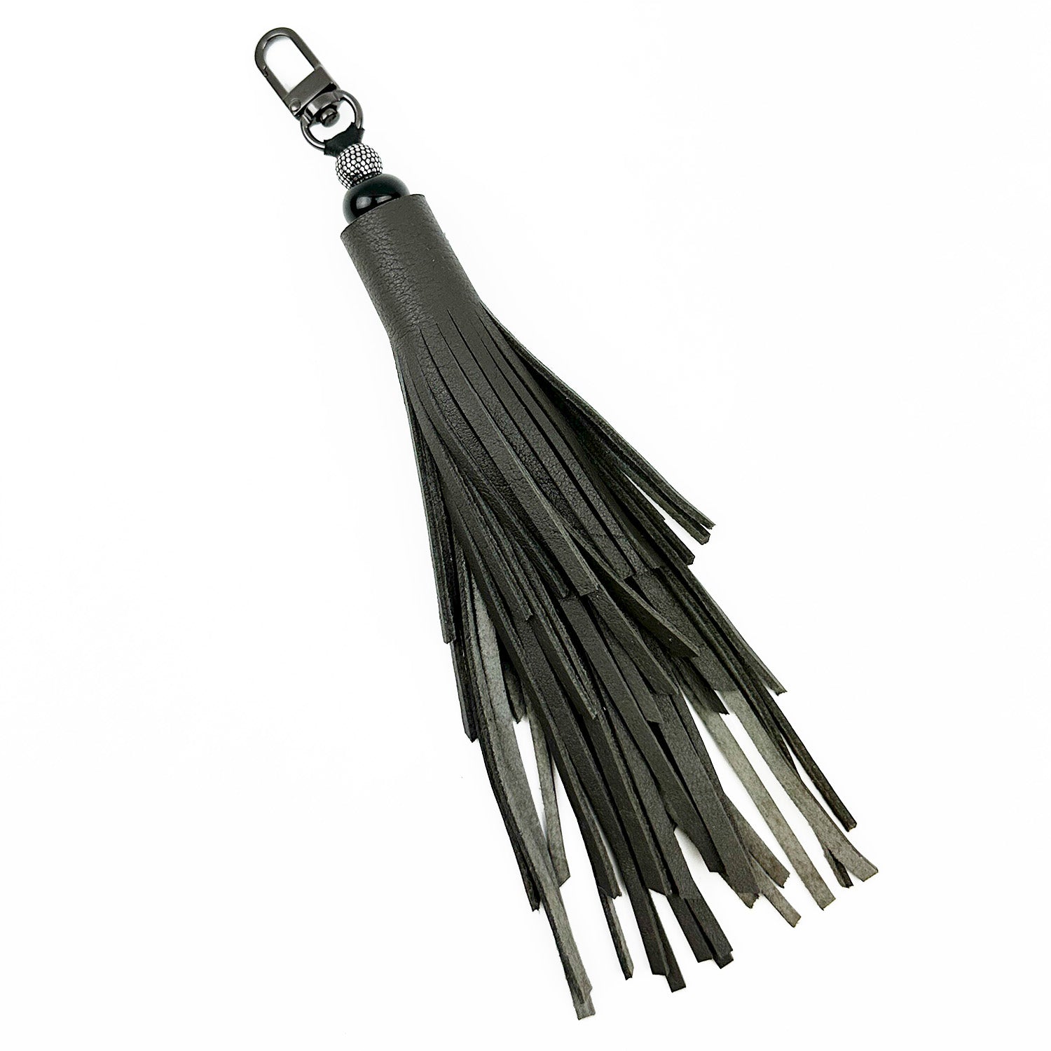 The olive-grey leather tassel keychain by evokewomen showcases a tiered tassel design with fringes and a gunmetal swivel hook for secure attachment.