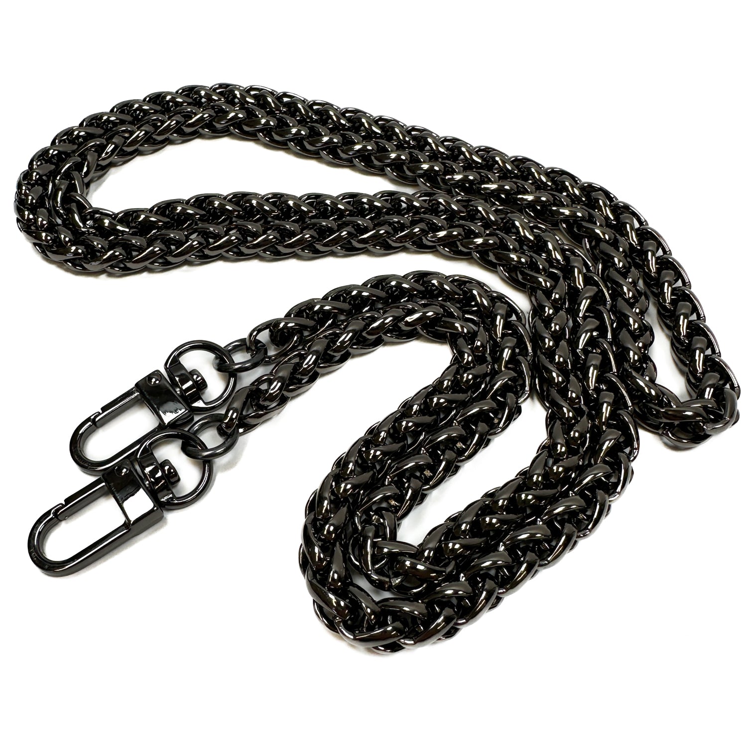 Introducing the SNAKE SPINE CHAIN - X-BODY LENGTH from evokewomen, a sleek and shiny black metal chain with two clasps at each end. This luxury accessory features a sophisticated gunmetal finish, perfect for adding an elegant touch to any ensemble.