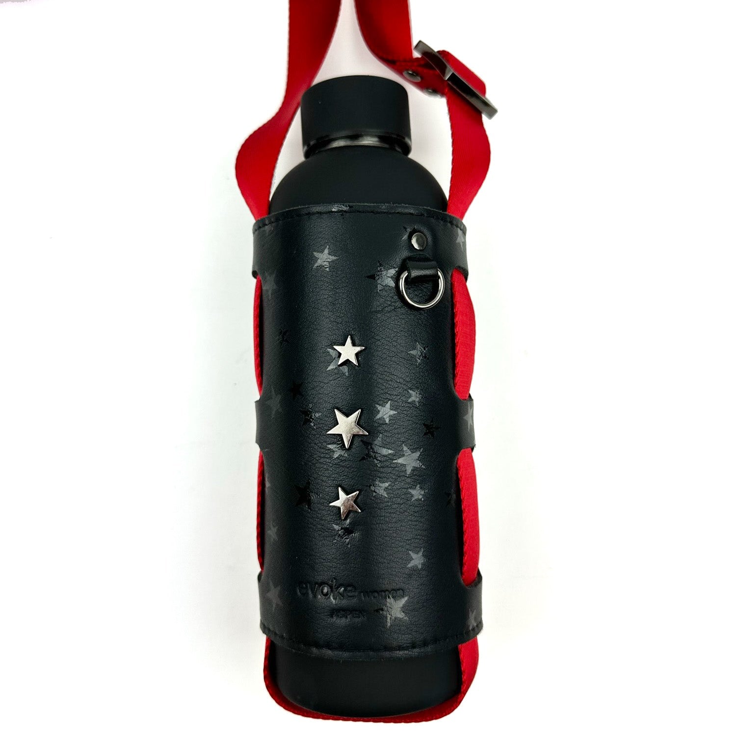 The Carrier - black stars by evokewomen features a black water bottle encased in a star-printed leather holder, complete with an adjustable shoulder strap for easy carrying.
