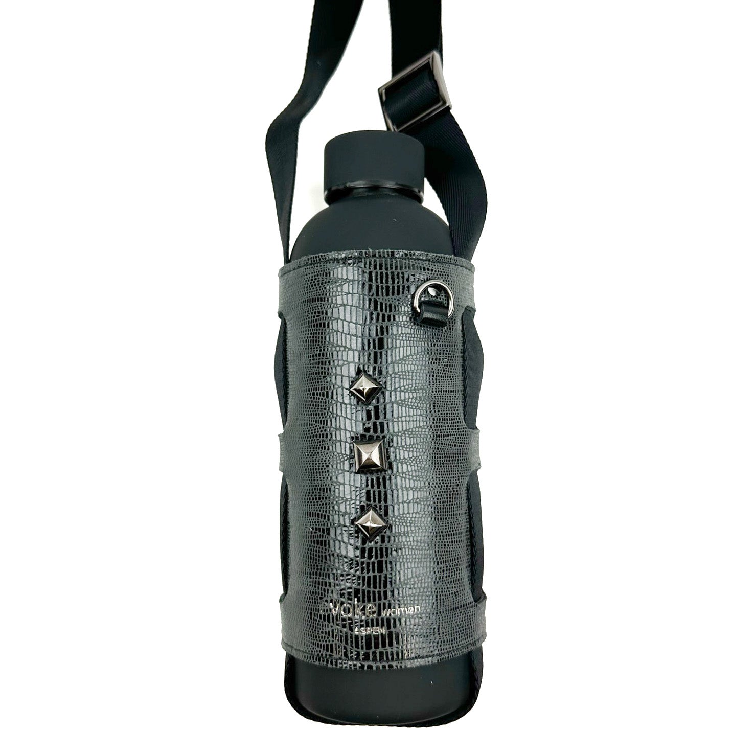 Introducing the Bottle Carrier - snake by evokewomen: a black water bottle encased in a faux snake leather holder, adorned with metal studs and equipped with an adjustable shoulder strap for easy portability.