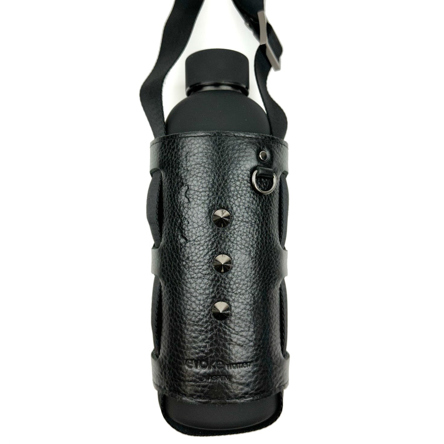 The Bottle Carrier - black by evokewomen features a studded leather strap holder and shoulder strap with a corset-style closure, adding an elegant touch to its design.