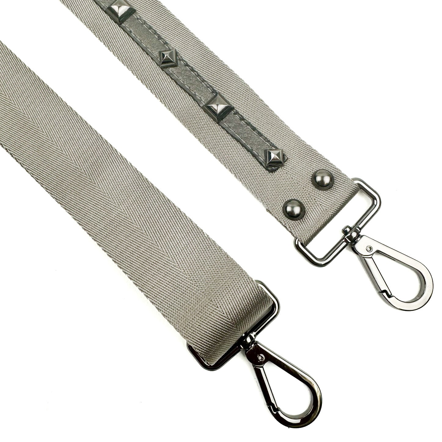 A SHOULDER STRAP - GREY-GREY from evokewomen, showcasing gunmetal accessories, metal clasps, and stud details on one section.