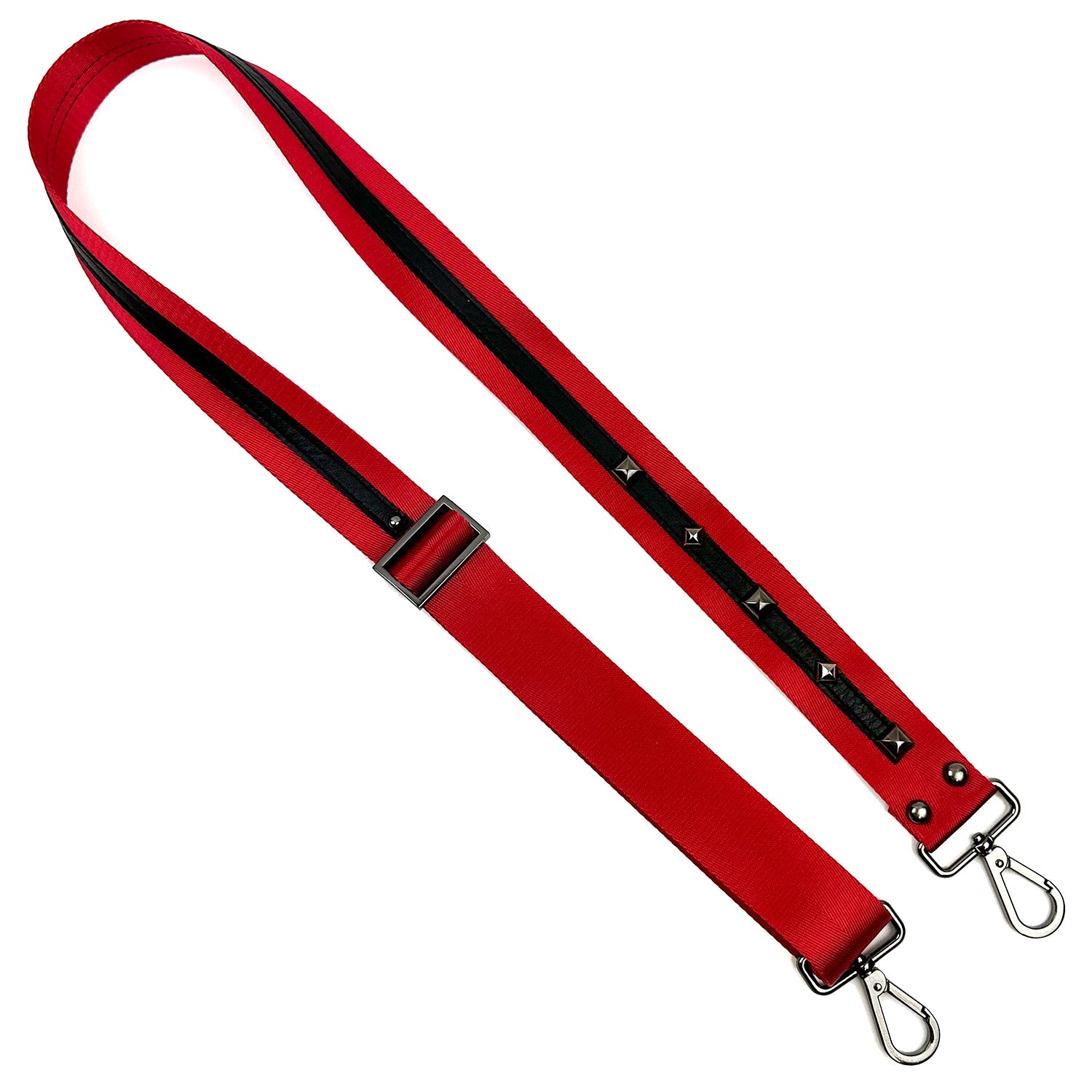 A SHOULDER STRAP - RED by evokewomen featuring a combination of red and black colors, adjustable design with metal clasps, decorative studs, and leather embellishments.