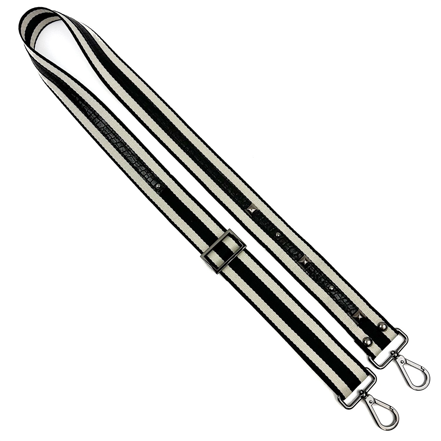 Evokewomen's SHOULDER STRAP - BLACK / OFF WHITE is designed with black and white stripes, adjustable nylon webbing straps, gunmetal accessories, and metal clasps on each end.