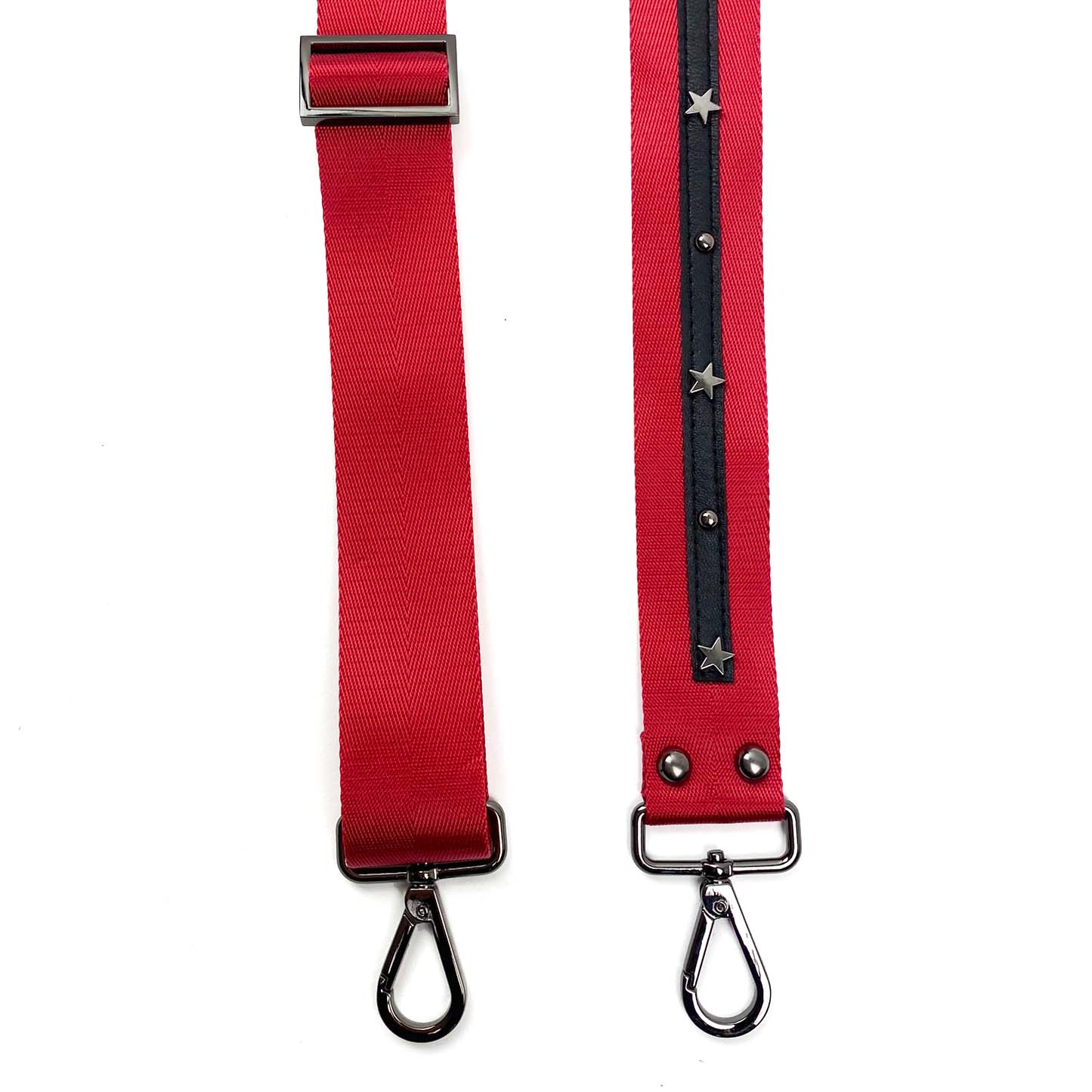 The SHOULDER STRAP - RED + stars by evokewomen features metal clasps and leather embellishments. One section is plain, while the other is adorned with a black strip and star studs, offering adjustable elements for a tailored fit.