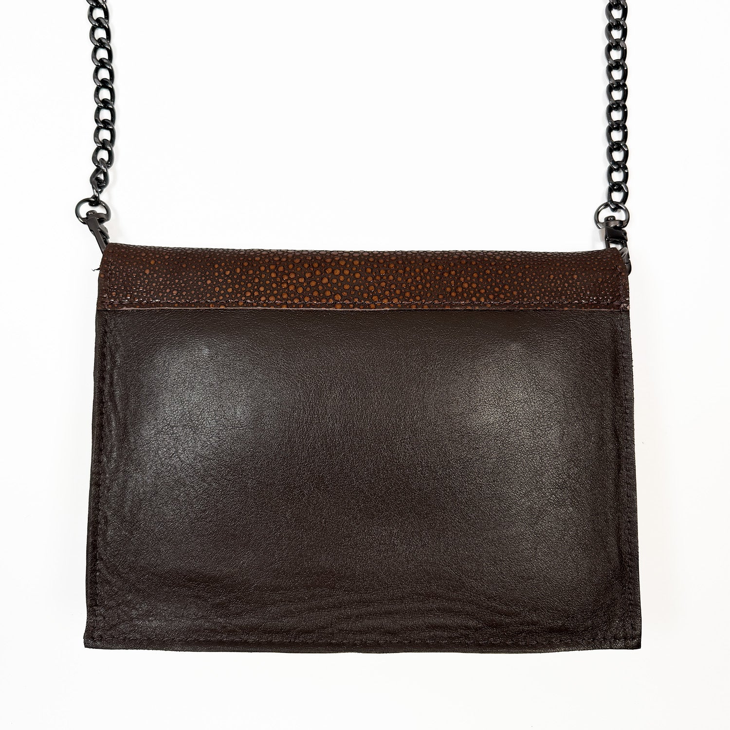 Chocolate brown leather crossbody bag with a chain strap on a white background