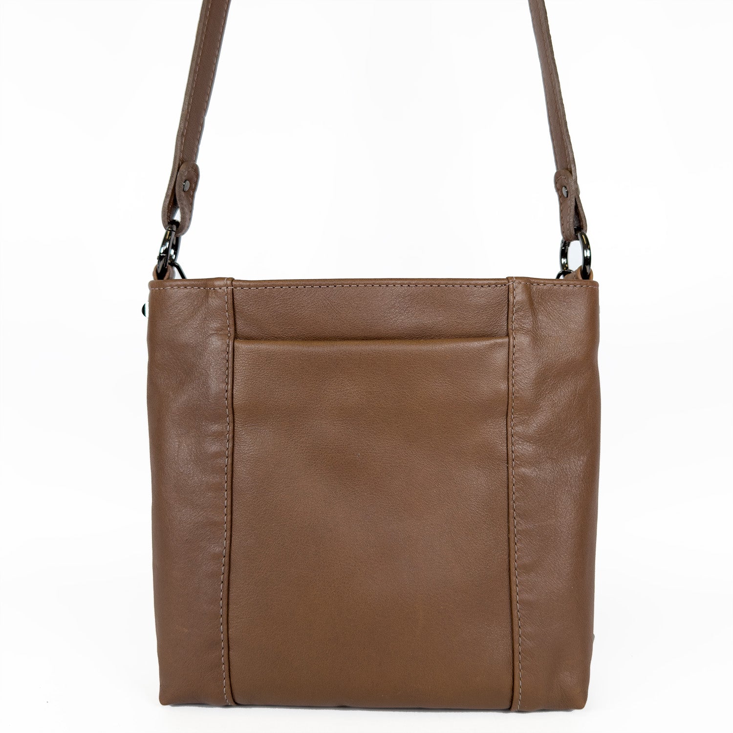 Introducing the Bailey - Nutshell by evokewomen: a sophisticated brown leather cross-body bag, meticulously crafted from premium Italian leather. It features a short strap and a streamlined design that exudes elegance.