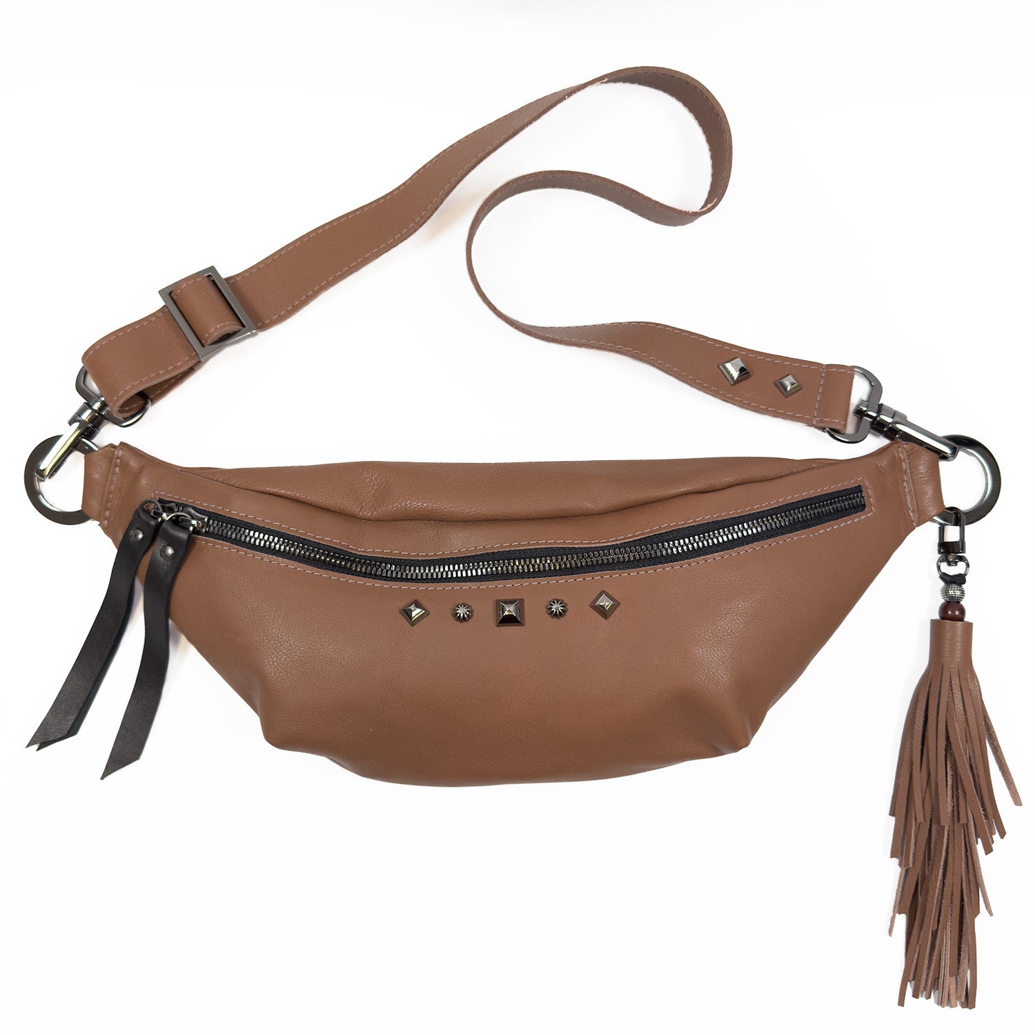 The STELLA - western brown from evokewomen is a fashionable accessory, featuring chic stud embellishments, a front zipper, an adjustable strap, and a playful tassel on the side.